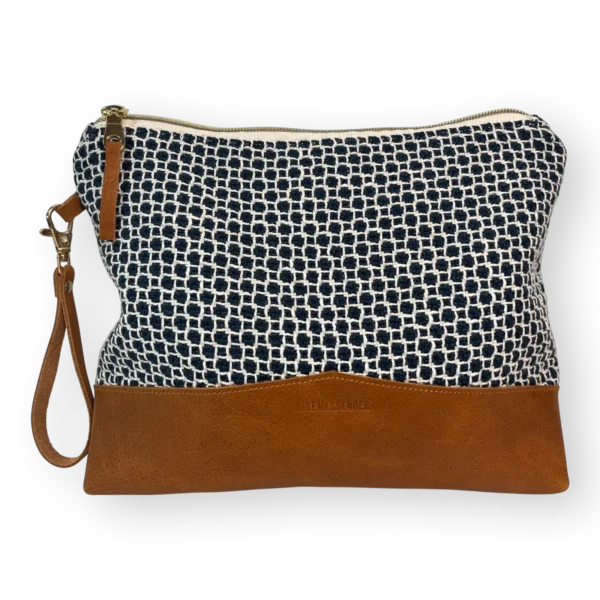 Drakensberg large leather pouch front with patterned navy and cream textile and tan genuine leather