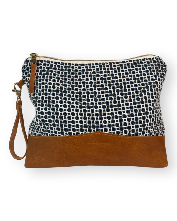 Drakensberg large leather pouch front with patterned navy and cream textile and tan genuine leather