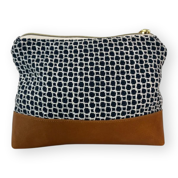 drakensberg-medium-leather-pouch-back Drakensberg medium leather pouch back with patterned navy and cream textile and tan genuine leather