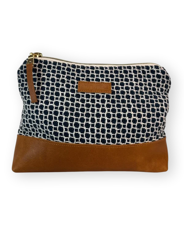 Drakensberg medium leather pouch front with patterned navy and cream textile and tan genuine leather