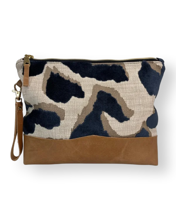 Tsitsikamma large leather pouch front with navy patterned textile and tan genuine leather